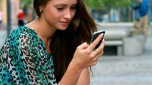 stock-footage-young-woman-working-on-a-mobile-device